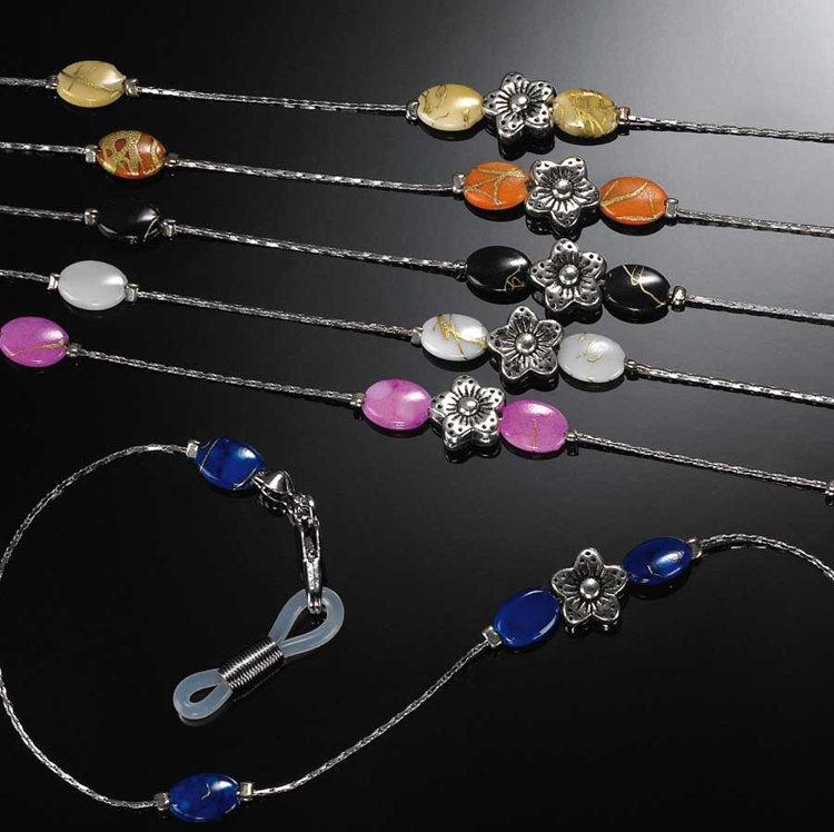 Bild von CentroStyle collection Paris Metall-Brillenkette - orangenfarbende Perlen